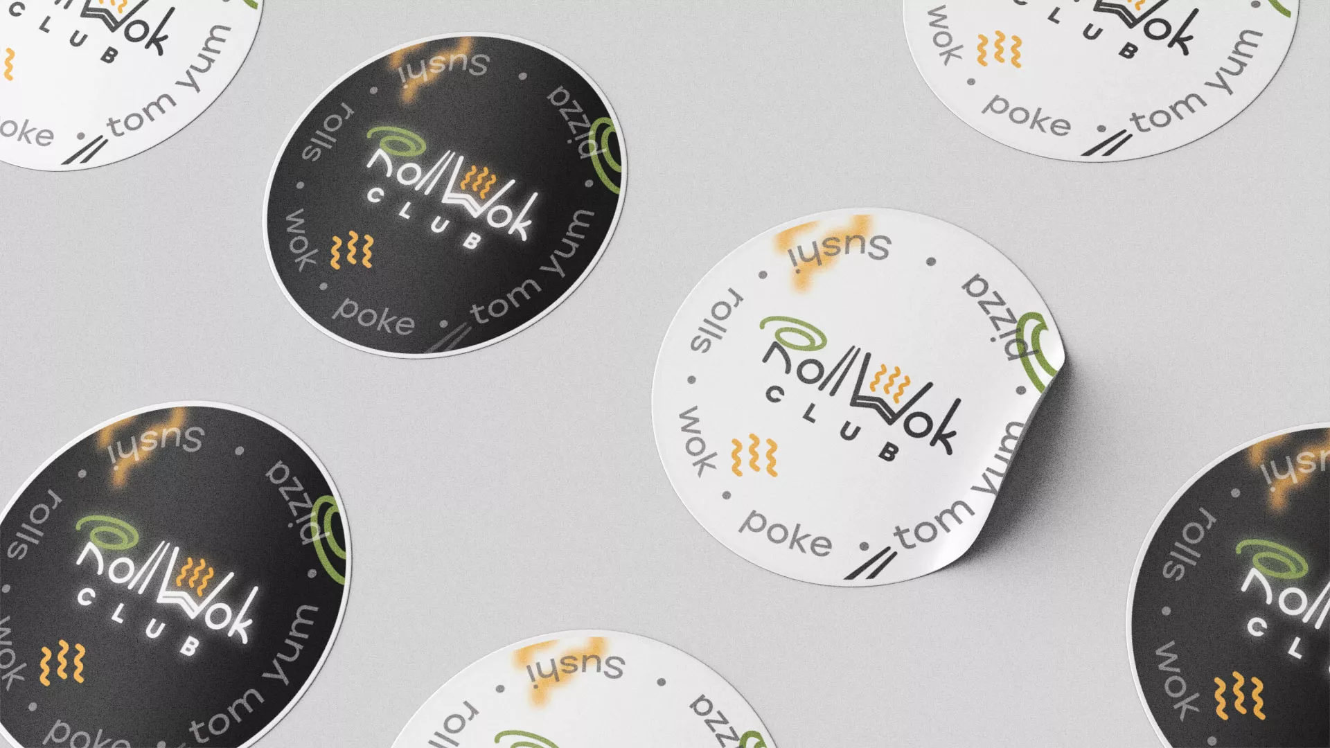 Разработка дизайна наклеек для суши-бара «Roll Wok Club» в Советской Гавани